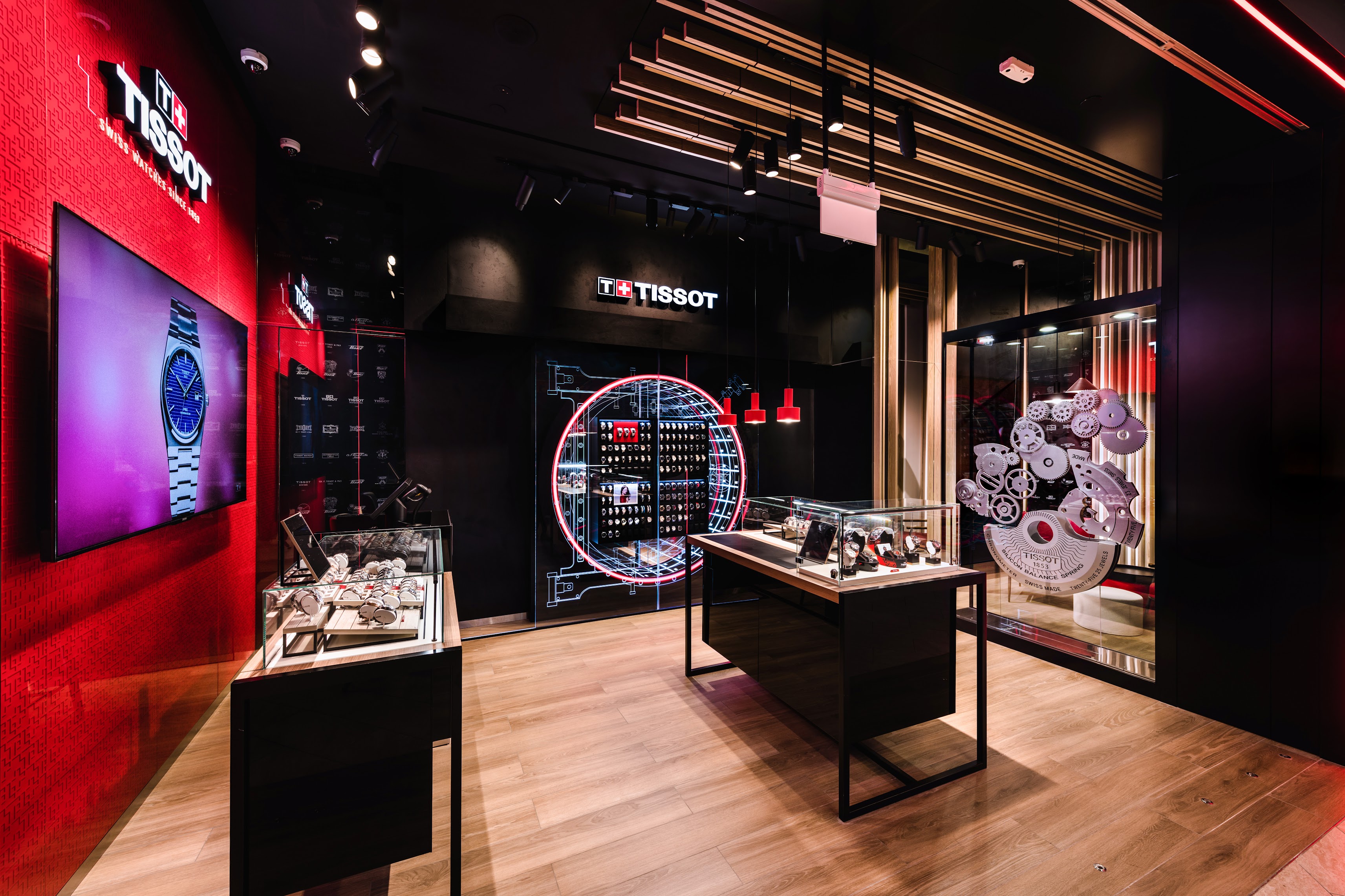 Tissot PLQ Boutique Singapore interior angle showing display wall and collections