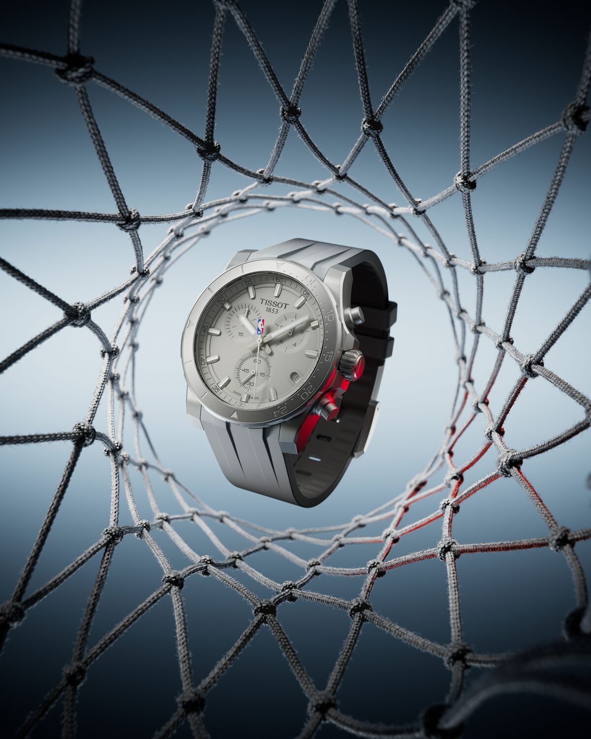 The Tissot NBA chronograph in grey, seen through a basketball net